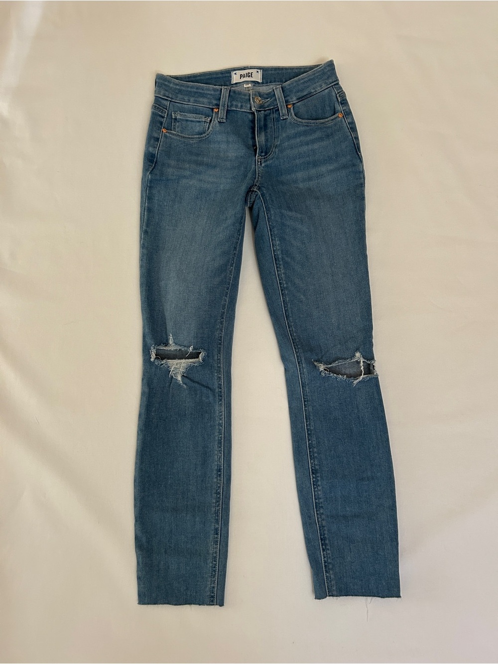PAIGE Skinny Jeans in Medium Blue with Knee Rips